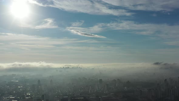 Above the clouds. Sunrise foggy morning. alt