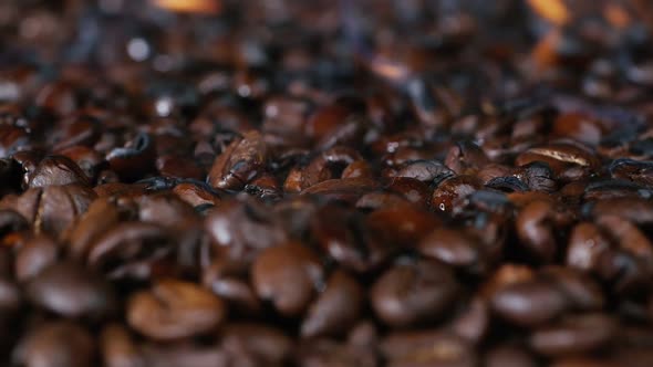 Close-up, Black Coffee Beans Roast, Coffee Aroma. Preparation of Coffee Beans, Professional Roasting