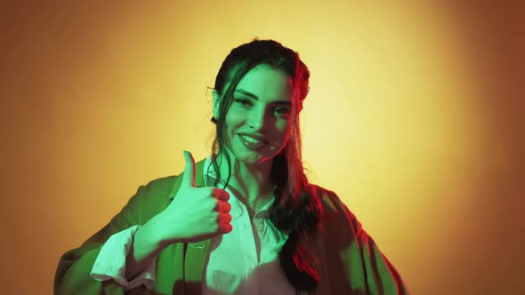 Approving Woman Like Gesture Neon Light Thumbs Up alt