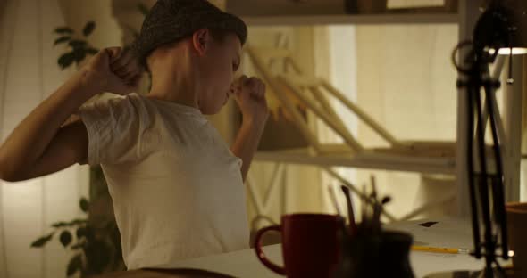 Boy Drawing and Stretching alt