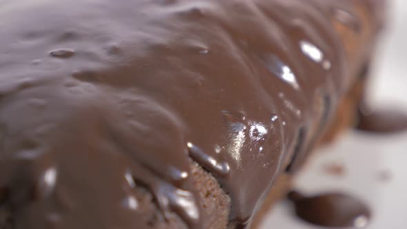 Chocolate cake glaze slow panning 4K 2160p UltraHD footage - Chocolate cake glazed  surface close-up alt