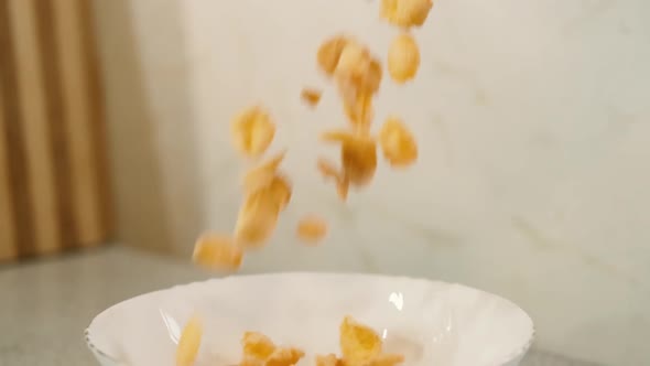 Corn Flakes Fall Into Bowl
