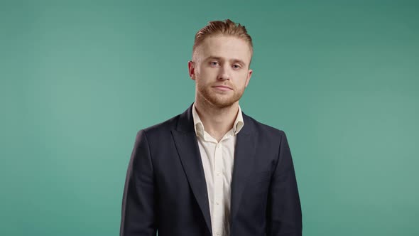 Serious Business Man Disapproving with No Head Sign Nods Head Disapprovingly alt