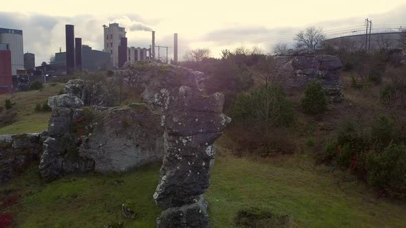 Drone Shot of Rocks in Front of Industry