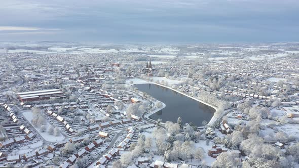 Aerial view of snow covered city in winter in UK