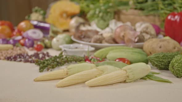 A Selection Of Various Colorful Vegetable And Spices On White Table. alt