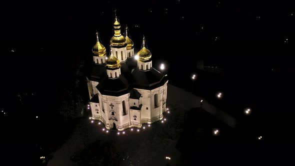 Beautiful Church With Golden Domes at Night