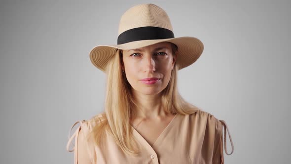 Portrait of Blonde in Hat