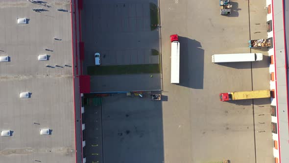 Aerial View of Cargo Containers and Distribution Warehouse alt