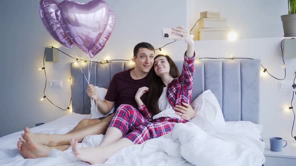 Couple Celebrate and Make Selfie at Home