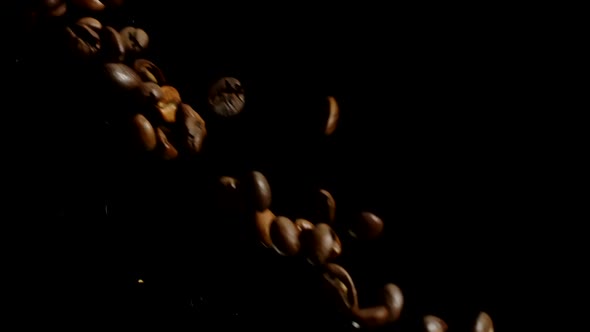 Premium Coffee Beans Pouring Down From Both Sides in Slow Mo, Black Background