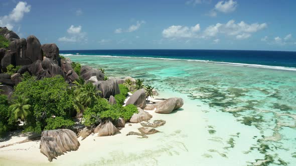 Aerial dolly over Anse Source d'Argent, La Digue Island, Seychelles alt
