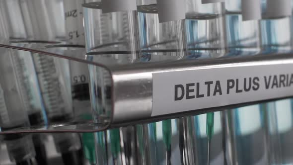 Delta Plus Variant Test Tube Sample Vials Rack. Pan Right, Close Up alt