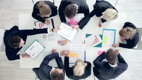 Business people work with statistics alt