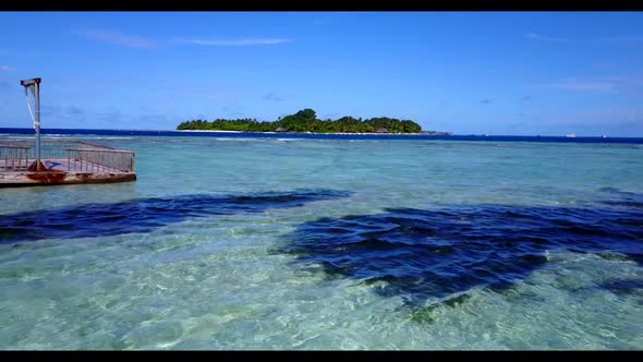 Aerial drone view tourism of tranquil resort beach vacation by clear water with white sand backgroun alt