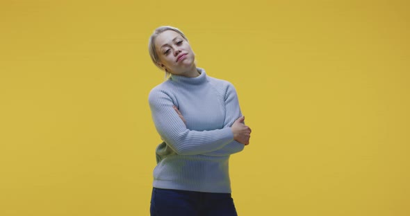 Woman Standing with Crossed Arms alt