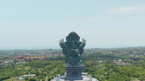 Giant Copper Statue of Garuda Wisnu Kencana in Cultural Park in Bali Indonesia alt