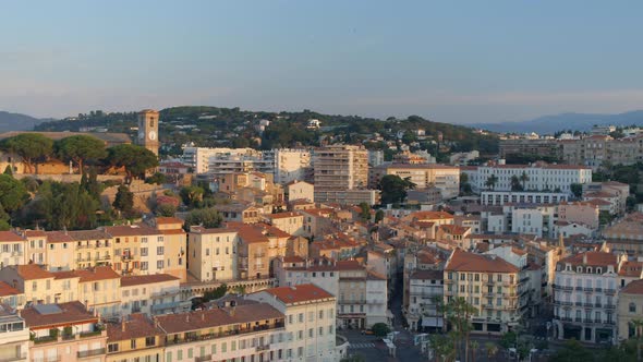 Clock Tower and City of Cannes at Sunrise alt