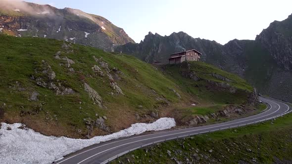 Sunset At A Chalet On Mountain