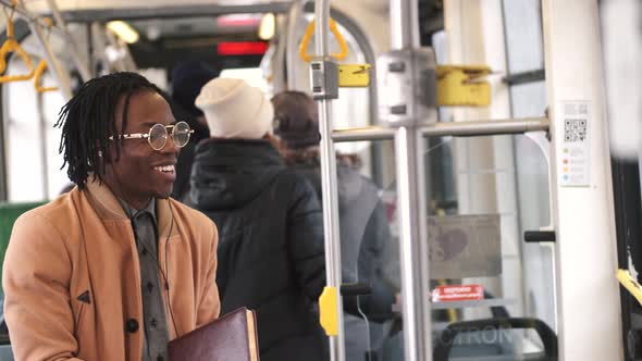 African Businessman Going To Work By Bus alt
