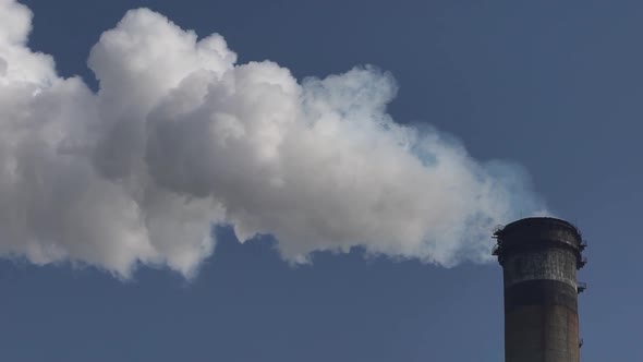 Smoke Comes From the Chimney. Air Pollution. Slow Motion. Ecology. Kyiv. Ukraine alt