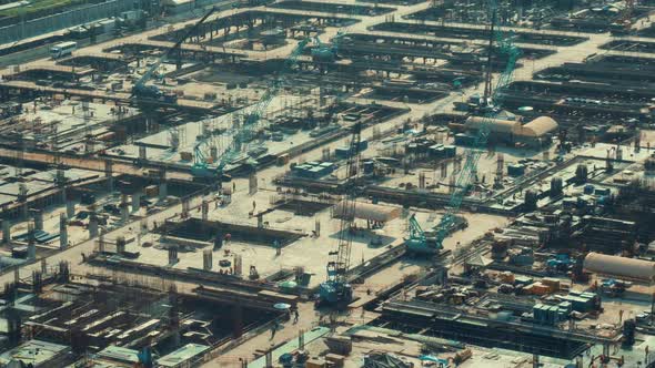 Time lapse of construction site with heavy construction machinery in metropolis alt