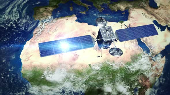 Africa. Highly detailed telecommunication satellite orbiting the Earth. alt