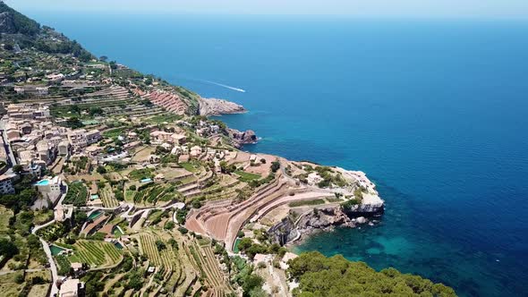 Aerial: Banyalbufar town in Mallorca, Spain alt