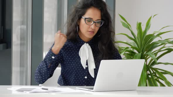 Shocked frustrated mixed race business woman student feel stressed look at computer screen.