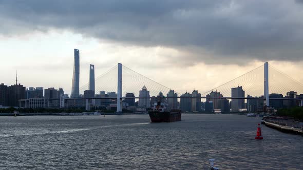 Chinese Vessels Under Shanghai Nanpu Bridge Timelapse alt