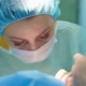 Surgeon Woman Performs Surgery on Patient - VideoHive Item for Sale