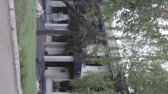 Vertical Video of a Burned Down Police Station in Ukraine During the War alt