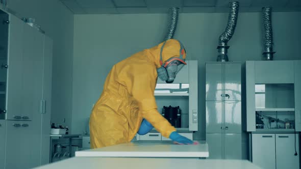 Laboratory Room with a Table Getting Sanitized By a Disinfector During COVID-19 Outbreak. alt