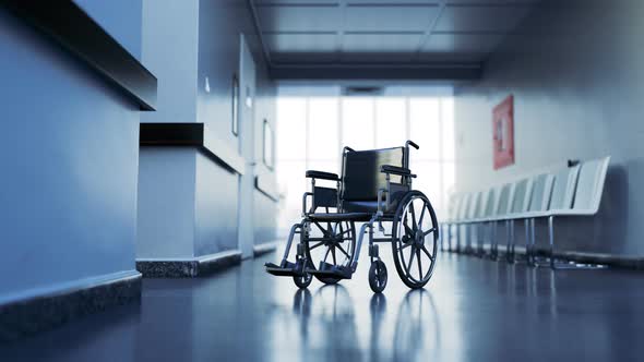 Abandoned wheelchair in empty, clean hospital waiting corridor. Disability in 4K alt