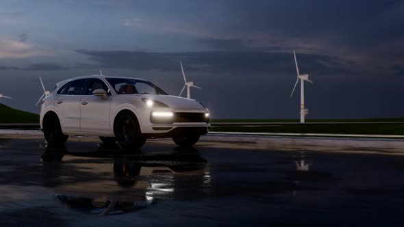 White Sports SUV and Wind Turbines