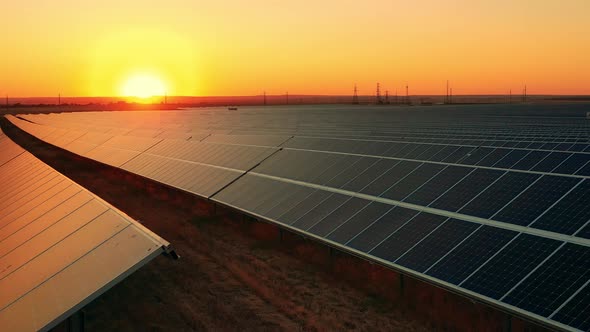 Drone Shot Solar Power Plant Sunset alt