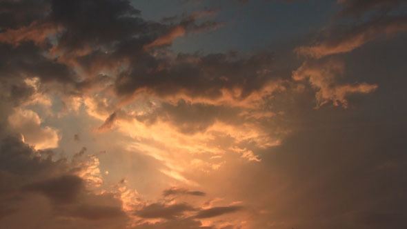 Sunlight Rays And Dark Clouds
