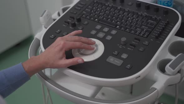 Doctor Doing a Doppler Sonography a Male Patient in a Cardiology Clinic alt