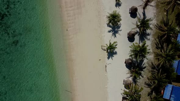 Aerial Top View on Beautiful Green Ocean on Beach with White Sand in Thailand alt