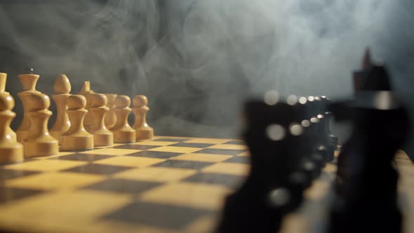 White and Black Pieces on Chess Board alt