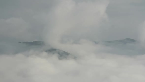 Time Lapse Fog Floating in Mountain Valley