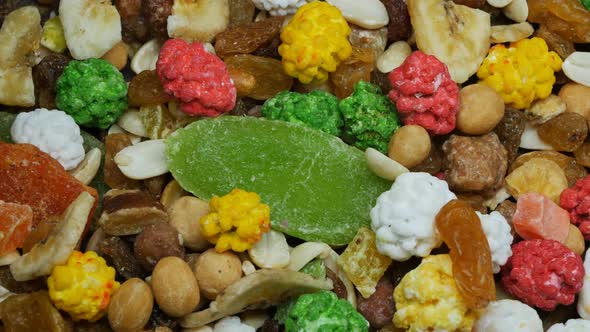 Top View Multicolored Colorful Mixed Dry Fruits and Glazed Nuts for a Delicious Tea Party alt