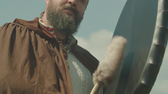 a Schuman Man Plays a Shamanic Drum Tries to Make It Rain Worship the Old Gods and Nature alt