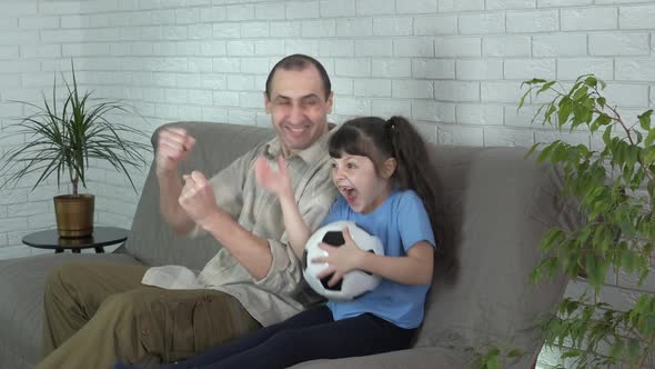 Family team and football.  alt