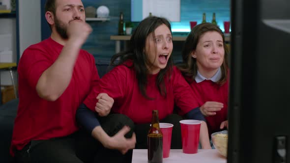 Excited Multiethnic Fans Having Fun While Watching Football Match alt