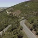 Flying Above The Road On The Lush Mountain In Reguengo Do Fetal In Batalha, Portugal With Distant Vi