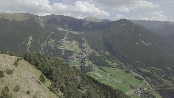 Aerial footage of drone flying above The Pyrenees mountains of Andorra in summer