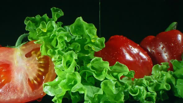 Pouring Dressing Over Fresh Vegetables alt