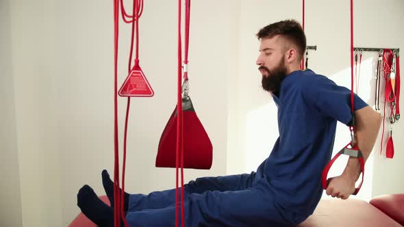 Physiotherapist Doing a Back Treatment to the Patient in Physiotherapy Room alt