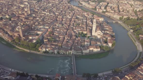 Aerial view of Florence historical cultural city churches cathedrals basilicas bridge on River Arno alt